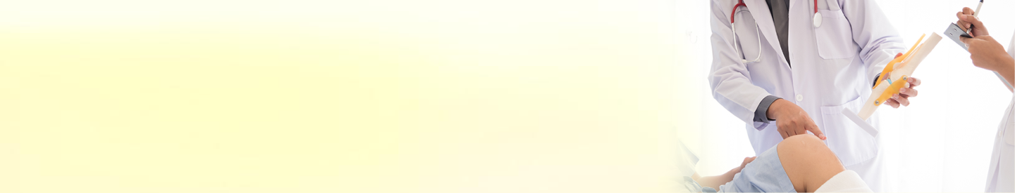 Doctor examining knee model