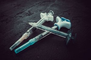 Sharing needles or syringes for drug use
